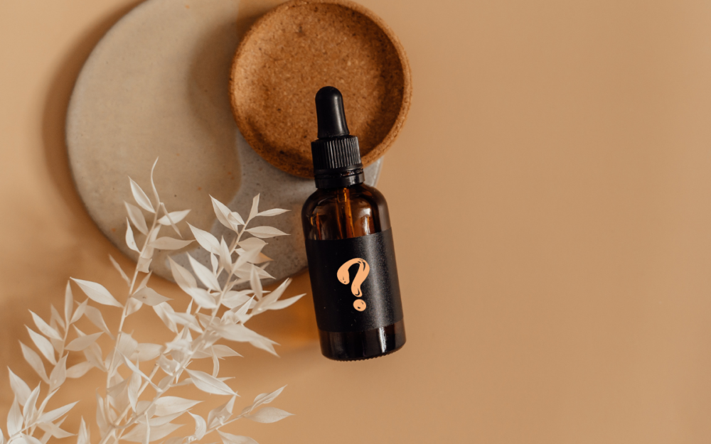 Buteleczka z ciemnego szkła ze znakiem zapytania